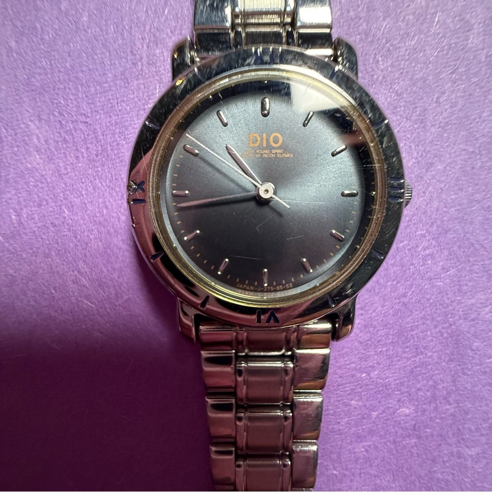 Silver and Black Analog Watch with Stainless Steel Band